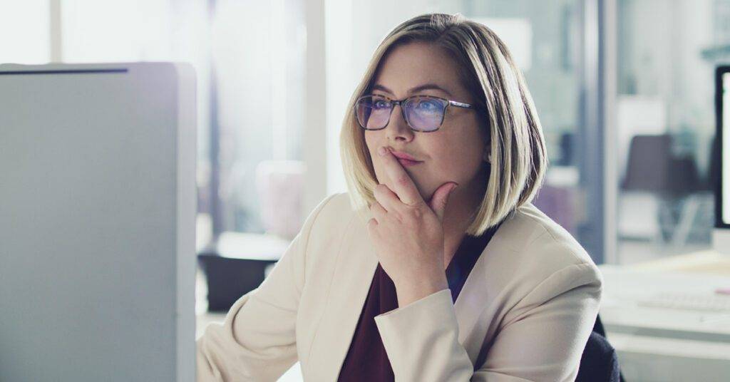 female office worker using a computer