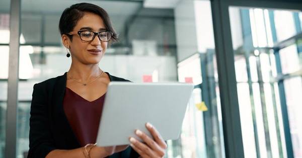 female professional working on a laptop